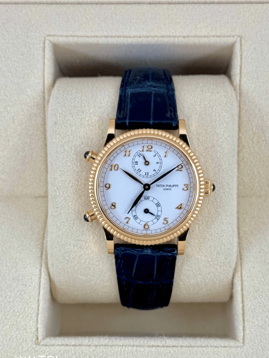 2002 Patek Philippe Travel Time 18k 29mm 4864R Yellow Gold White Dial